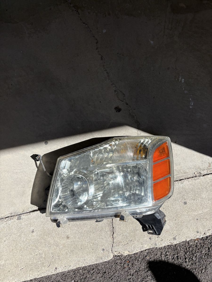 Nissan Armada / TItan OEM driver headlight