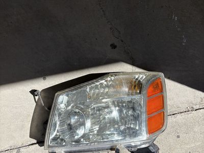 Nissan Armada / TItan OEM driver headlight