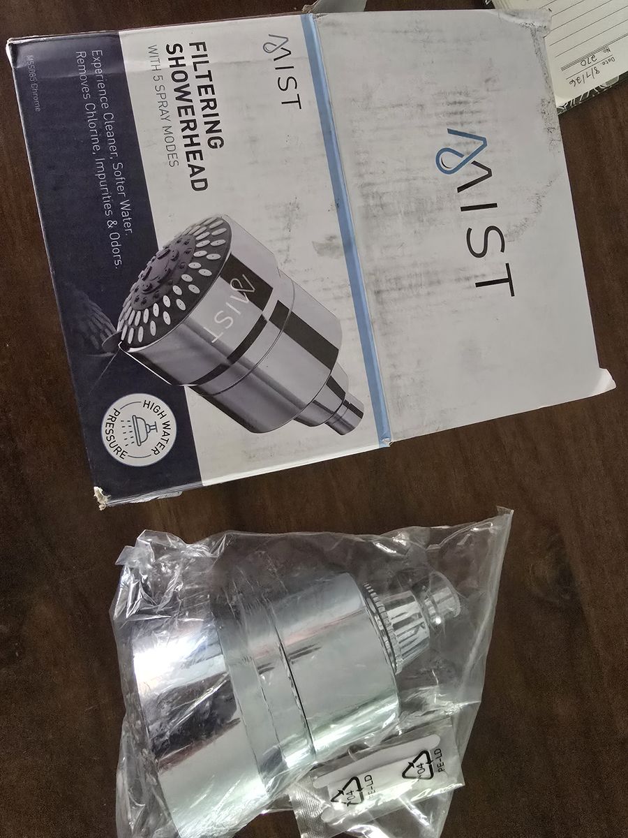 Mist filtering shower head