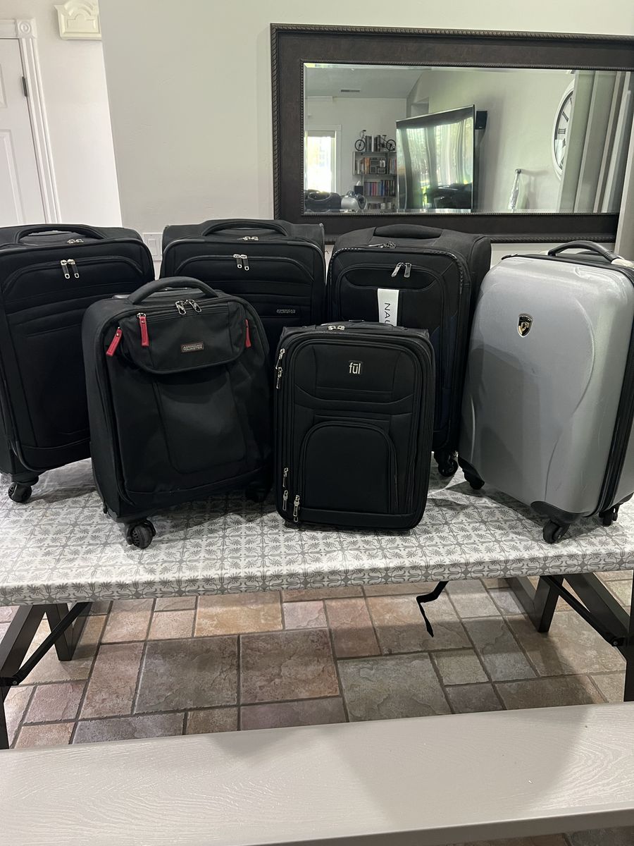 Assorted carry-on luggage (American Tourister, Nautica, Ful & Heys)
