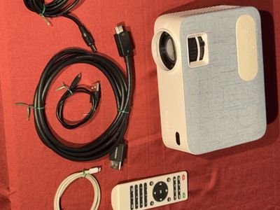 FANGOR Portable Mini Projector with Remote & Cable Accessories