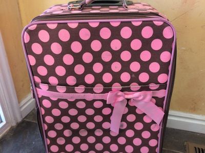 pink and brown polka dot suitcase
