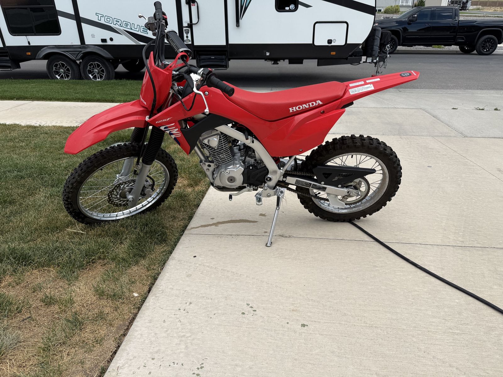 2025 CRF 125 W/ about 10 hrs