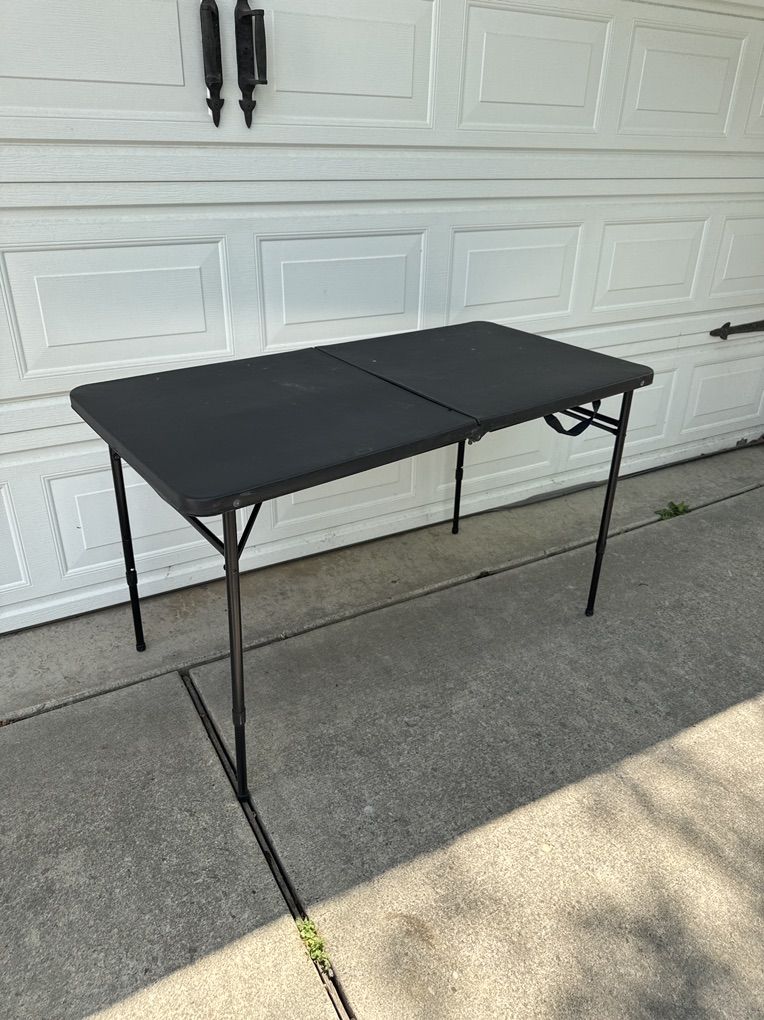 Folding Adjustable Height Table  $22.00