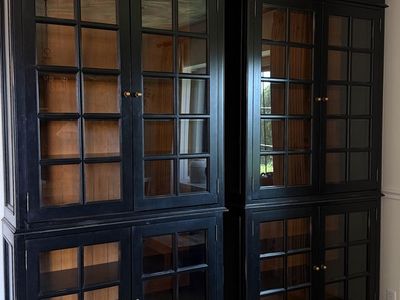 Set of two tall black cabinets