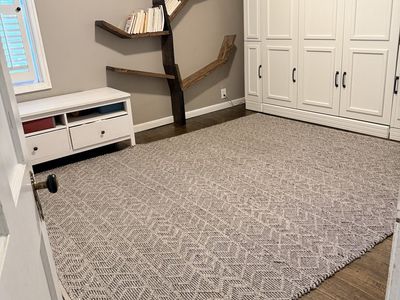 8x10 Diamond shaped, dark gray throw rug