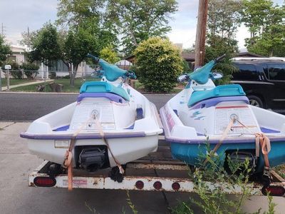 2 waverunners and trailer