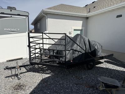 2 Snowmobiles And Trailer