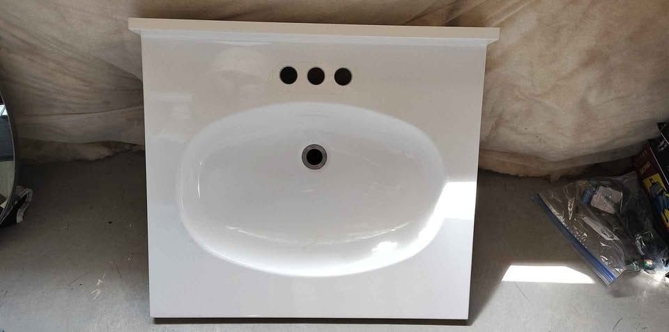 25 in by 22-in white cultured marble single sink center set faucet bathroom vanity top