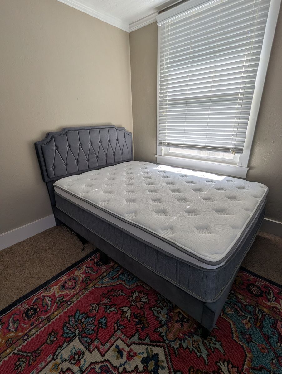 Full-sized mattress with headboard