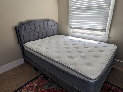 Full-sized mattress with headboard