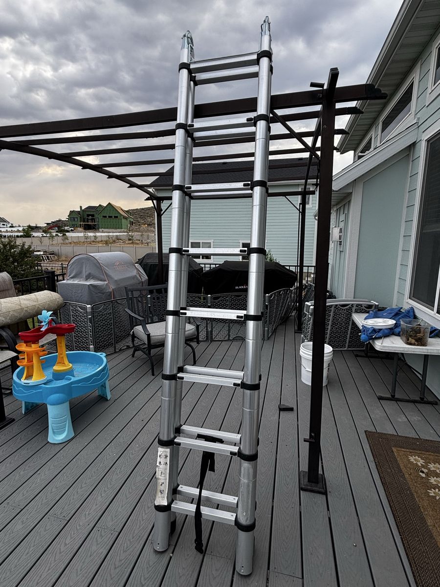 Telescoping multi position ladder