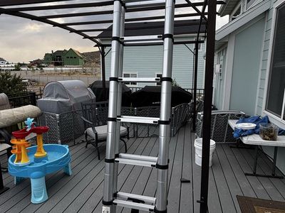 Telescoping multi position ladder
