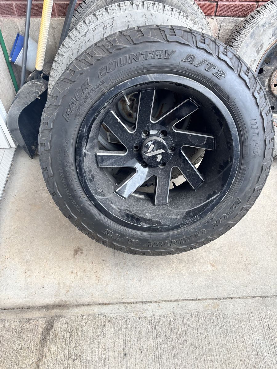 Back Country A/T2 LT285/60R20 All-Terrain Tire on Black KMC XD Series Wheels all 4