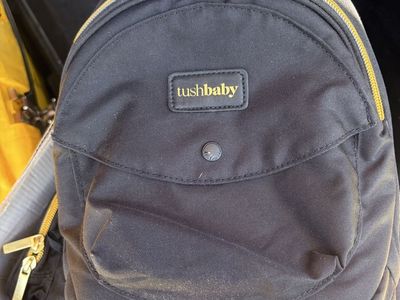 Tush baby carrier