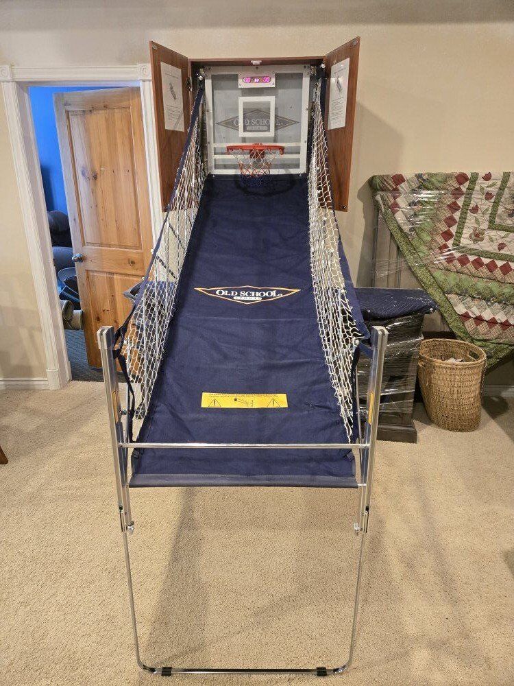 Wall mounted foldable basketball hoop