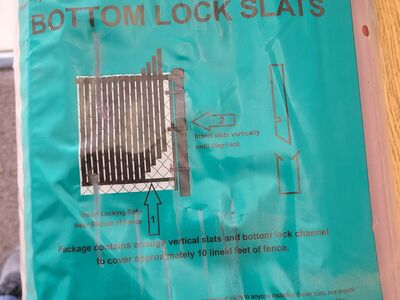 Bottom lock slats for fence
