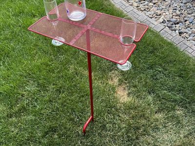 Portable table and drink holders. Stick in the ground