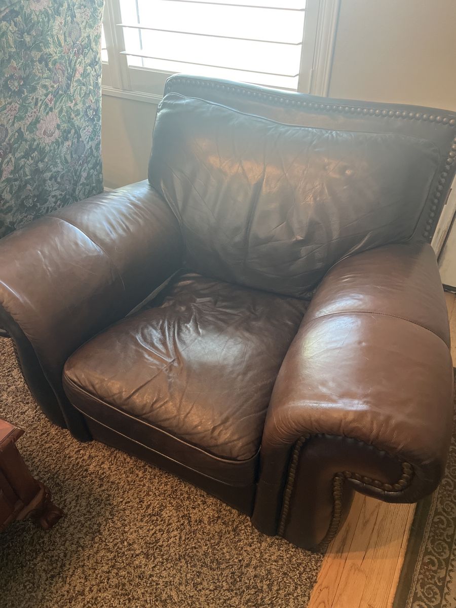 Comfortable Brown Leather Armchair with Nailhead Trim obo