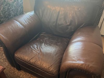 Comfortable Brown Leather Armchair with Nailhead Trim obo