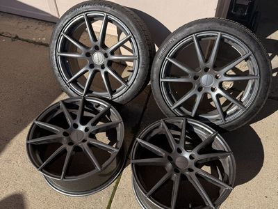 Set Of 4 18 Inch Wheels (Two Include Tires)