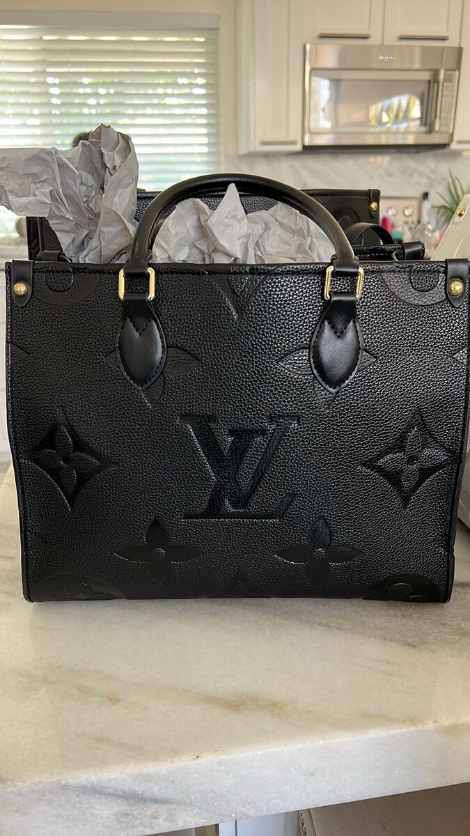 Gorgeous, leather embossed purse