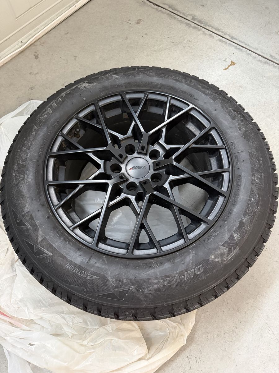 TSW Black Alloy Wheels with Bridgestone Blizzak DM-V2 Tires 225/65R17