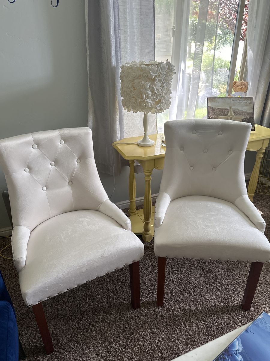 Pair of White Tufted Dining Chairs with Nailhead Trim