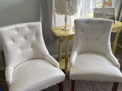 Pair of White Tufted Dining Chairs with Nailhead Trim