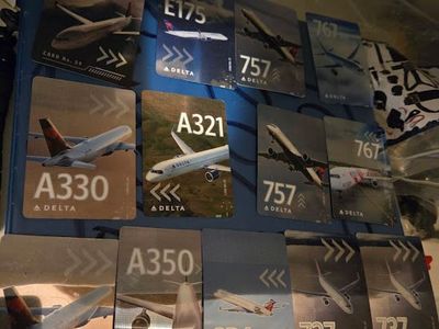 Pack of 13 brand new Delta trading cards