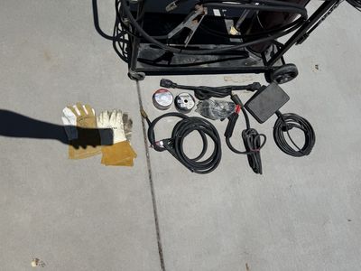 Lincoln Electric Power MIG 210 Dual Welder with Cart, Tank, and Accessories