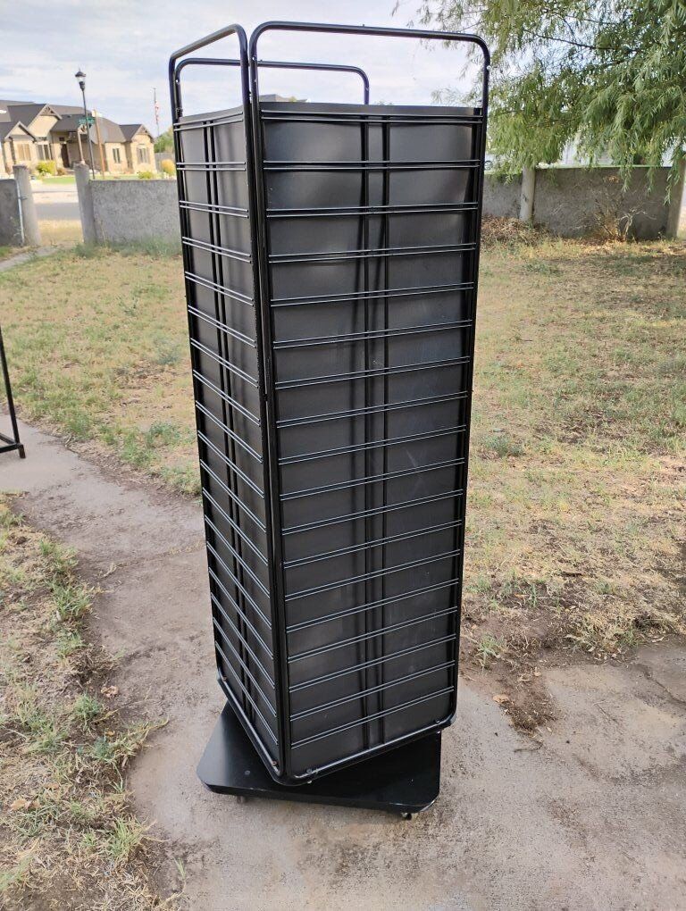 Rolling, Spinning Display Rack For Merchandising