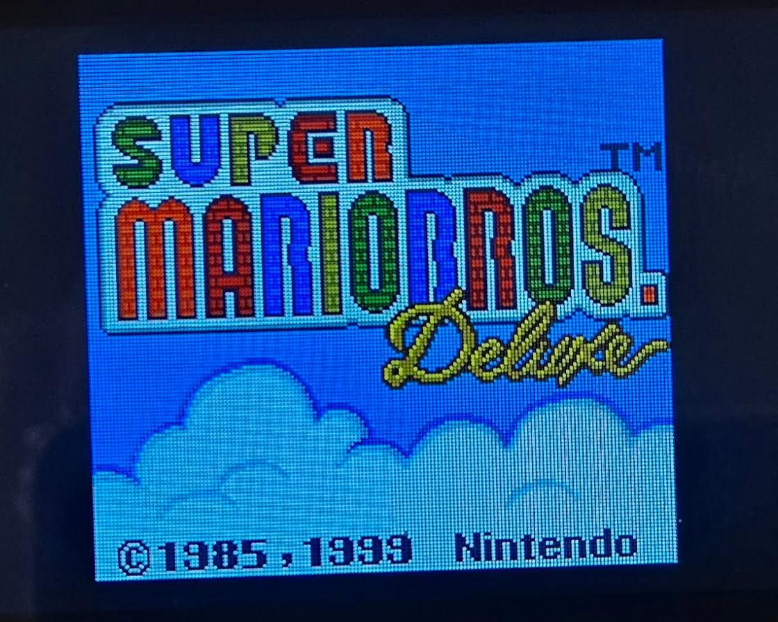 Nintendo Gameboy color  bundle including Super Mario Deluxe! trades considered!