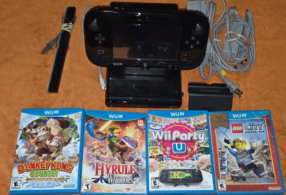 Wii U Deluxe with 6 games! trades considered!