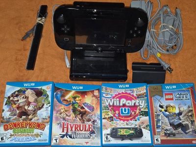 Wii U Deluxe with 6 games! trades considered!