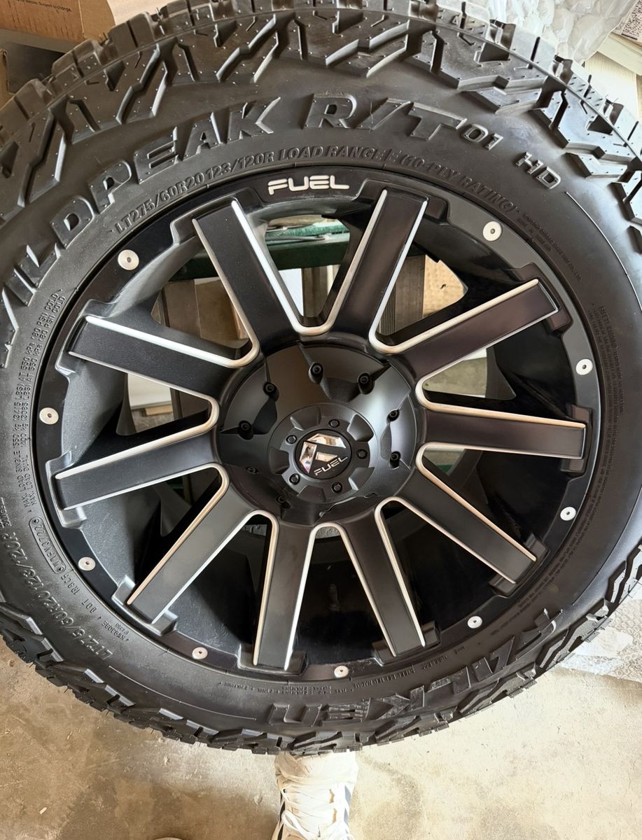 Set of 4 Practically New Falken Wildpeak A/T Tires w/ black fuel rims
