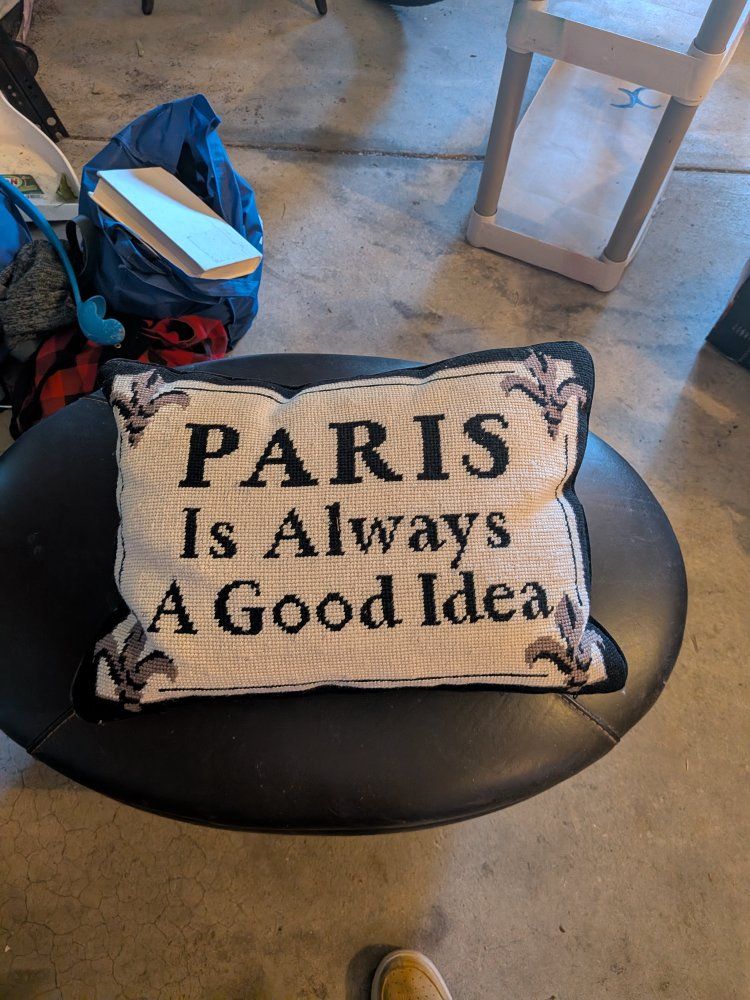 gold plated lamp and couch pillow