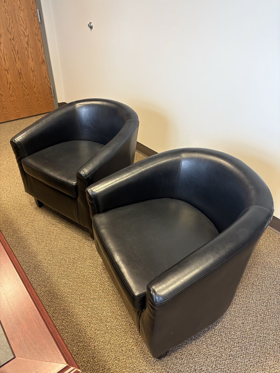 Black barrel chairs