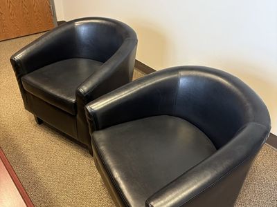 Black barrel chairs