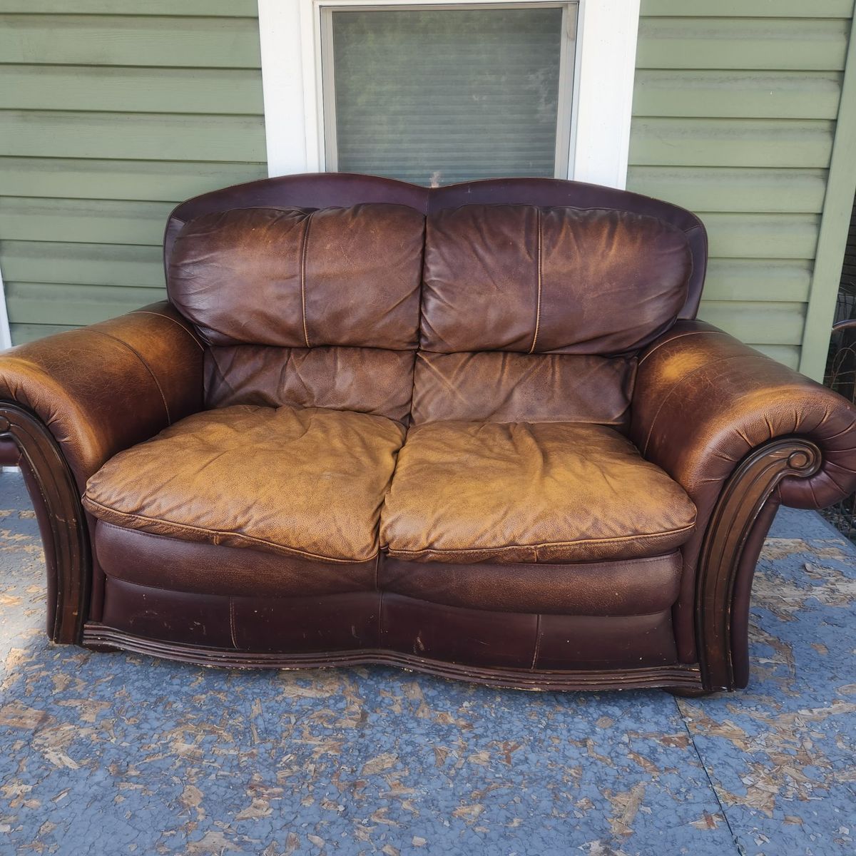 Used Brown Leather Loveseat - Good Condition with Minor Wear