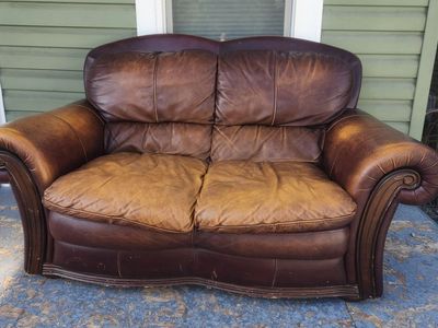 Used Brown Leather Loveseat - Good Condition with Minor Wear