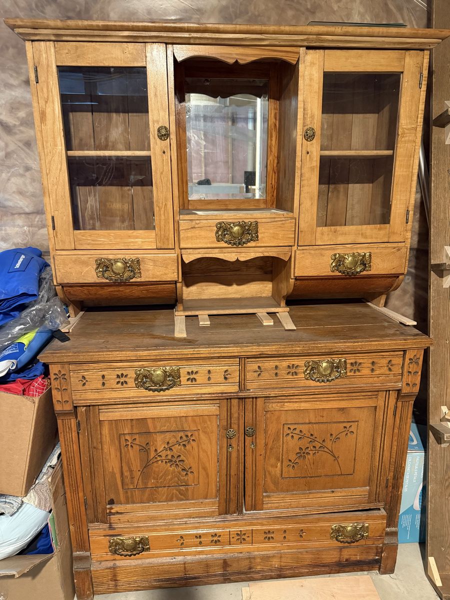 Antique Wooden Hutch Buffet with Glass Cabinets, Mirror, & Intricate Carvings