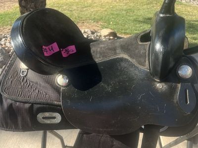 For sale, a lightweight 16-inch black western saddle in good used condition.