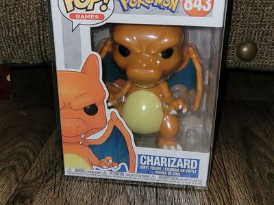 Funko pop pokemon charizard with protector case