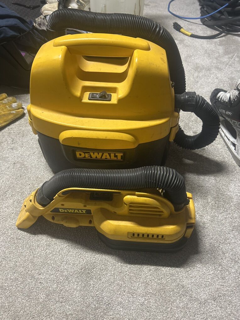 2 DeWalt vacuums