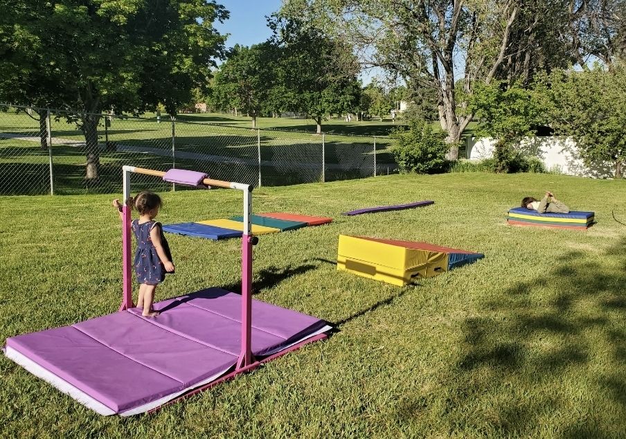 Gymnastics bar, matts & beam