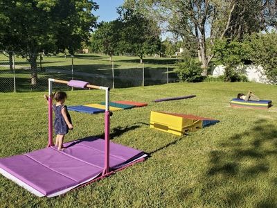 Gymnastics bar, matts & beam