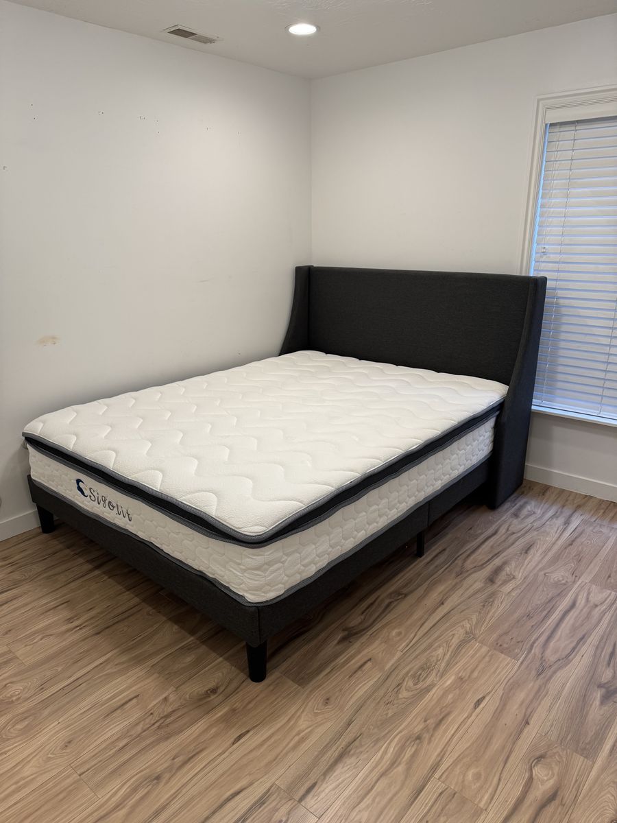 Newer queen bed and mattress.