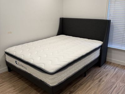 Newer queen bed and mattress.