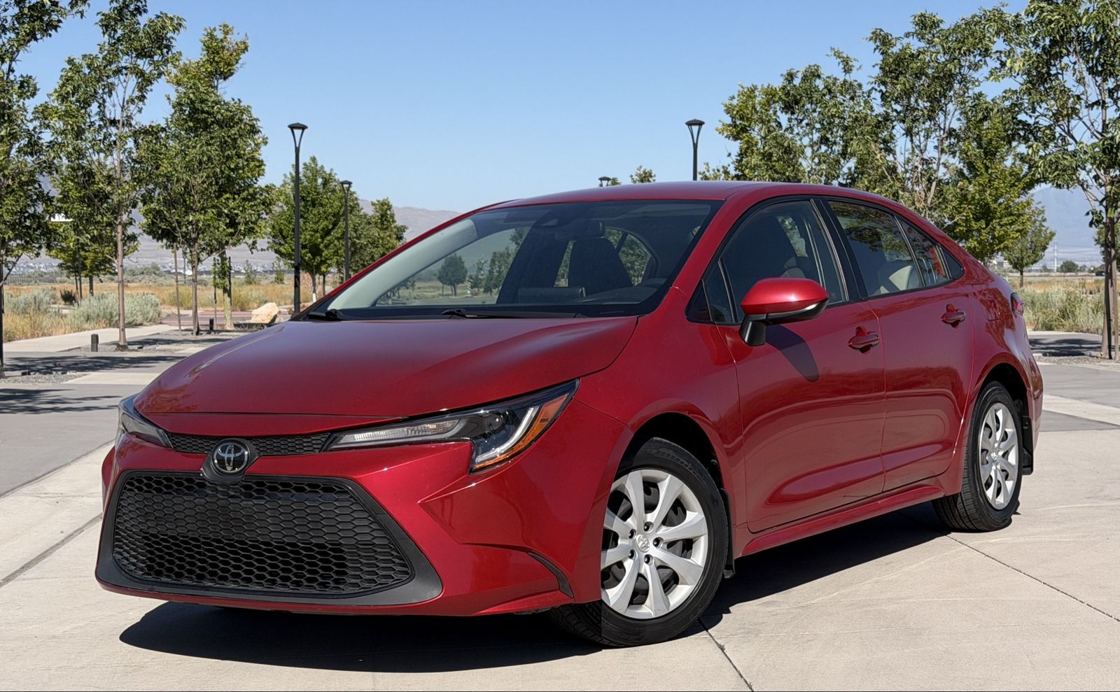 2020 Toyota Corolla LE — rebuilt & branded title, 17% below market
